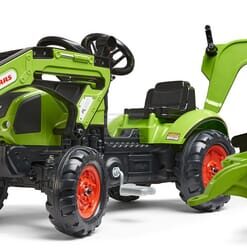 Retroexcavadora Claas con cargador frontal y remolque
