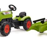 Tractor con remolque, excavadora y capó de apertura Claas