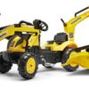 Retroexcavadora Komatsu con cargador frontal y remolque
