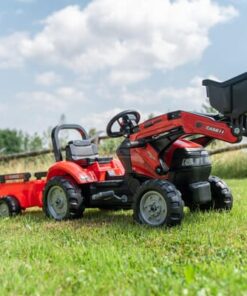 Retroexcavadora Case IH con remolque