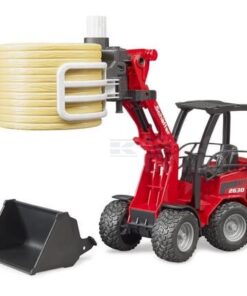 Cargadora compacta Schäffer 2630 con pinza para pacas y 1 paca redonda