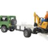 Land Rover con remolque y excavadora