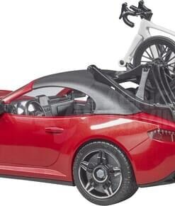 Roadster con 1 bicicleta de carretera y ciclista